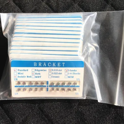 New China Supply MIM Technology Orthodontic Brackets with Mesh Base Braces