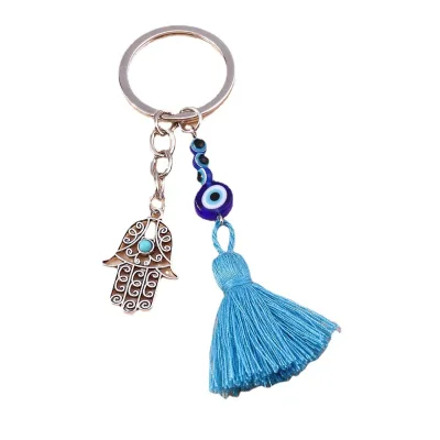2024 Hot Selling Blue Evil Eye Hamsa Hand Keychain Zinc Alloy with Tassel Demon Eye Charm for Bag Decoration and Car Keychain