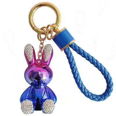 Fashion Woven Eco-Friendly PU Rabbit Leather Rope Keychain Pendant with Alloy Electroplating Cute Cartoon Baby Design Small Gift