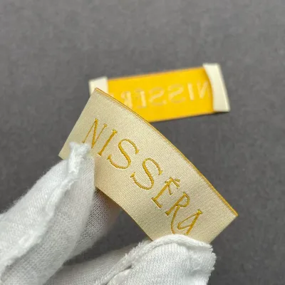Custom High-end Gold Woven Clothing Labels Custom Color Logo End Fold Eco-friendly Polyester for Football Jerseys Sports Pants