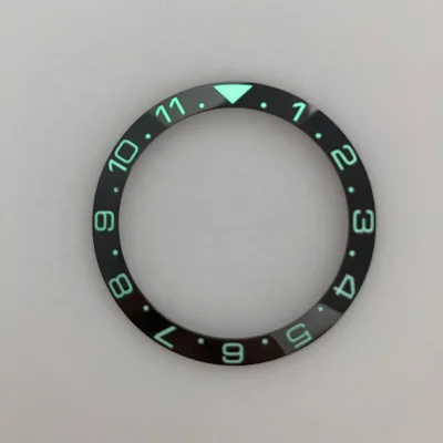 007 38mm Dual Time Black Watch with Green Luminous Ceramic Bezel Insert Sloping Feature