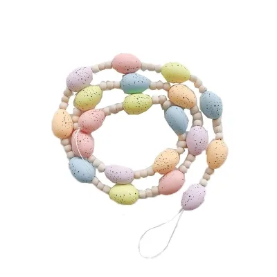 Easter String Eggs Beaded Eggs Hanging Through Simulated Eggs Easter Scene Arrangement