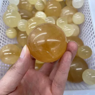 Wholesale Cheap Price Polished Natural Crystal Healing Stones Yellow Honey Calcite Ball Spheres for Decoration