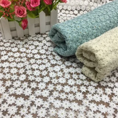 Manufacturer direct sale new high-end hollow embroidery fabric mesh lace small daisy water-soluble embroidery fabric