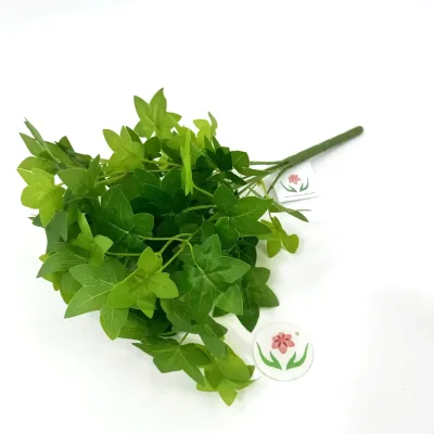 A Large 7-pronged Artificial Green Plant Bundle Is Used for Store Decoration and Outdoor Setting