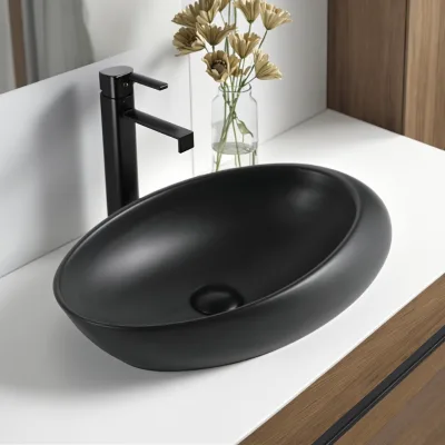 CORONIS China Modern Artistic Matte Black Ceramic Oval Wash Basin Easy Clean 5 Year Warranty Single-Hole Faucet Mount for Hotels