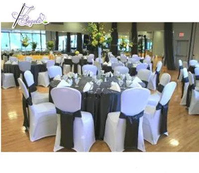 White Stretch Fitted Chair Covers with Black Sashes in Wedding Events