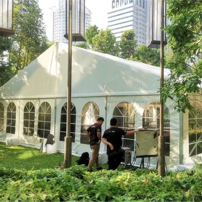 Elegant Glasshouse-Style Wedding Tent with Panoramic Views and Climate Control for All-Season Celebrations and Gatherings