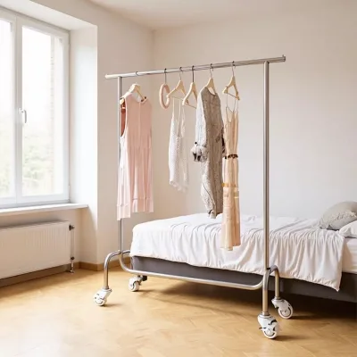 Stainless Steel Brushed Silver Minimalist Modern Clothes Rack Wheels Island Stand Women's Clothing Store Floor-standing Rack