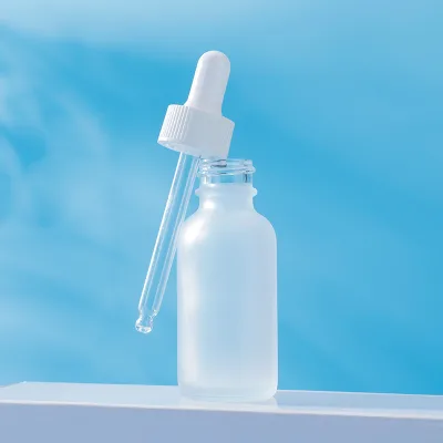 High Quality Custom Flat Shape Essential Oil Bottles 15ml 30ml 60ml Scrub Packed in Carton with Pump Sprayer Seal