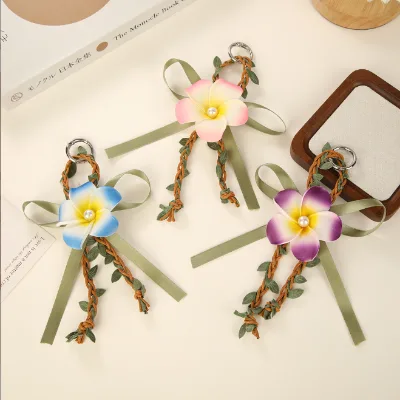 Wholesale Handmade Artificial Frangipani with Vine-woven Bow Keychain Birthday Party Gift for Friends Phone Charm Bag Pendant