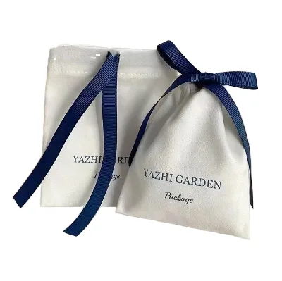 Minimalist Organic Suede Jewelry Pouch with Security Feature Suede Branding Grosgrain Ribbon Drawstring Closure