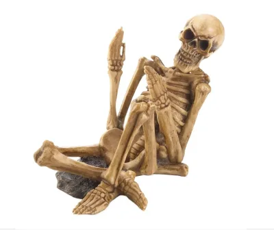 Polyresin/Resin Grinning Beige Polyresin Spooky Skeleton Wine Bottle Holder Halloween Decor