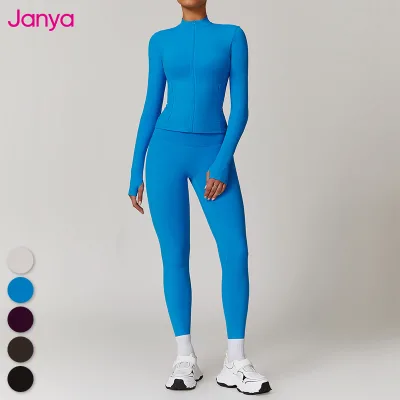 Janya Hot Sales Women Training Suits Brushed Zipper Pockets Thumb Hole Shirts and No Front Seam Scrunch Butt Yoga Leggings Sets