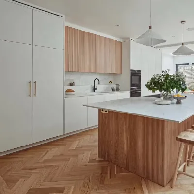 Modern Two-Tone White & Light Oak Kitchen Cabinets with Fluted Accents, Contemporary Cabinetry Set with Island & Brass Hardware