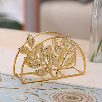 European-style Hotel Restaurant Paper Organizer with Golden square Napkins on the Countertop