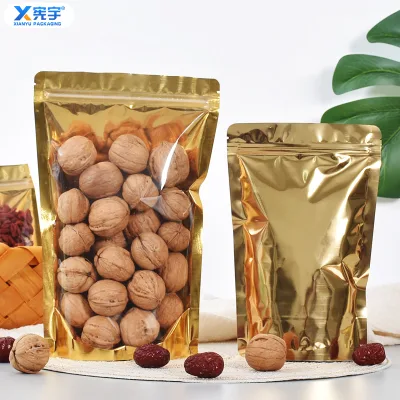 Wholesale One Side Transparent Golden Zipper Stand up Pouch Plastic Aluminum Foil Zipper Bag for Candy Nut Walnut Almond Cashew