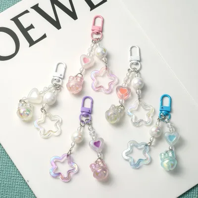 New Style Glitter Hollow-out Acrylic Five-pointed Star Car Keychain Pendant with Cream Two-tone Bell Accessory Bag Ornament