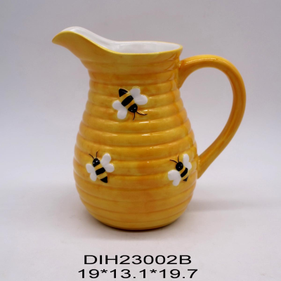 Handpainted ceramic pitcher with bee decoration