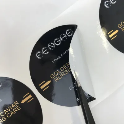 Custom Printed Cosmetic Logo Sticker Waterproof PP Synthetic Label With Gold Foil Cosmetics Bottle Label Cosmetics Vinyl Label