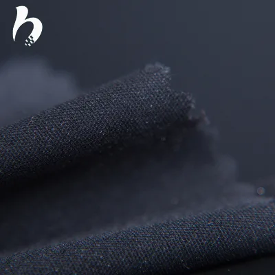 Hot Selling 75D Water-jet Woven Fusible Adhesive Interlining 100%polyester Voile Fabric Double Dot technic PA Coated 150cm Width