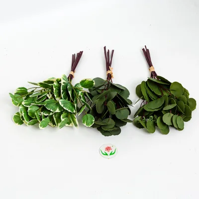 Artificial Green Plants with 8 Round-leaf Bundles on Both Sides Are Used As Wedding Flower Arrangement Materials