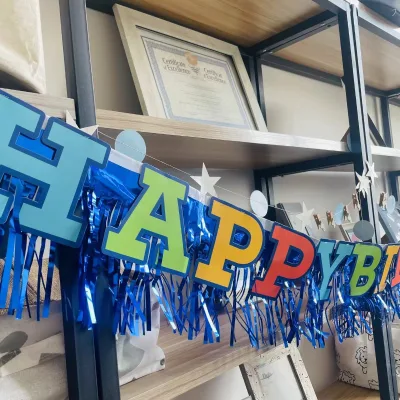 Happy Birthday Banner with Shiny Tinsel