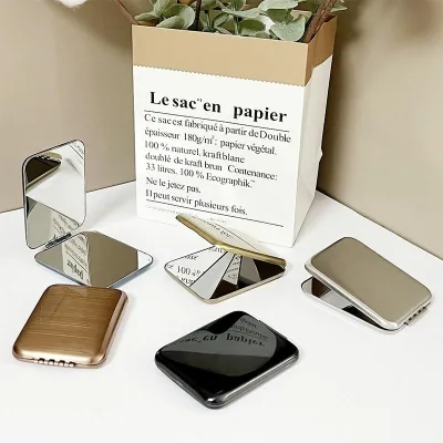 Factory Direct Hot Selling Compact Stainless Steel Makeup Mirror Double-Sided Folding Hand Mirror with Laser Engraved Logo