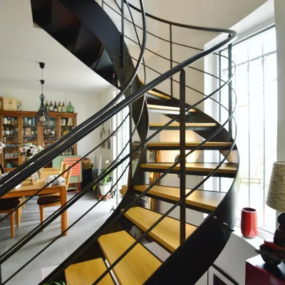 Robust Exterior Curved Staircase Weather Resistant Design for Outdoor Patio Access