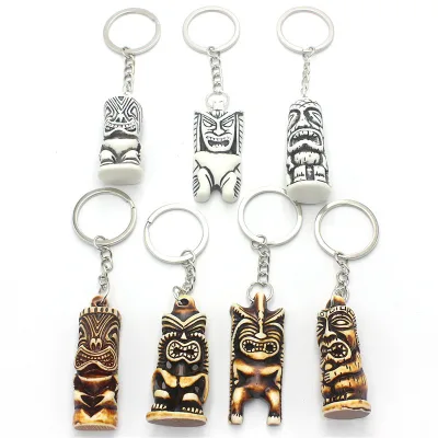 Wholesale Student Bag Resin Keychain Ornaments Unique White Brown Simulation Bone Carving Tiki Keychain Gifts for Women Men