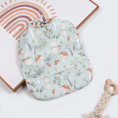 Wholesale OEM 100% Cotton Waterproof PU Kids Eating Bib with Pocket Reusable Lace-up Closure Anti-Bacterial