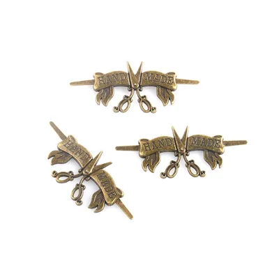 Wholesale Price Vintage Alloy Bag Accessories High Quality Custom Metal logo Labels Handmade for Handbags