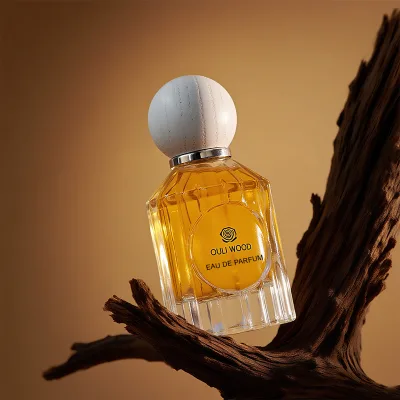 Wholesale Elegant Faceted Glass Perfume Container 50ml Empty Fragrance Bottle with Natural Wood Lid for Custom Logo