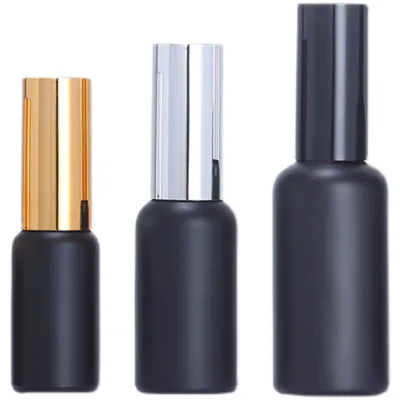 OEM Custom Logo Light-Proof Matte Black Glass Essential Oil Bottle UV Spray Lotion Pump Empty Cosmetic Packaging Modern Fashion