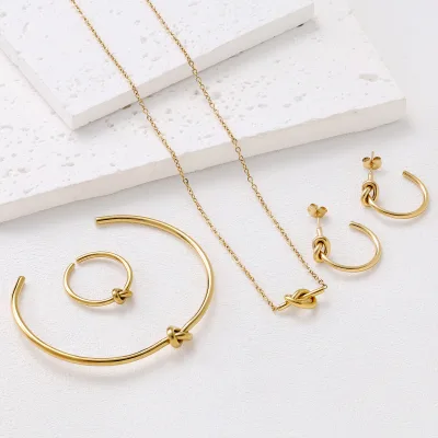 New Stainless Steel Heart-knotted Pendant Necklace Bracelet Earrings and Ring Set - Women's Niche Versatile Accessories