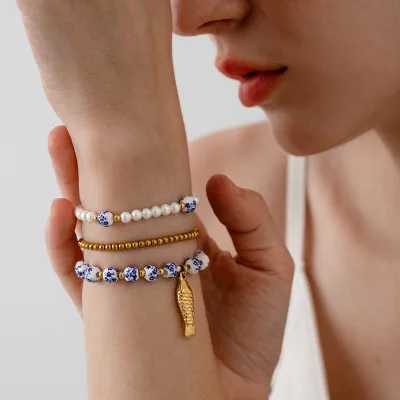 Tarnish Free 18K Gold Plated Stainless Steel Beads Ceramics Pearl Charms Fish Stackable Beaded Bracelet for Women Wholesale