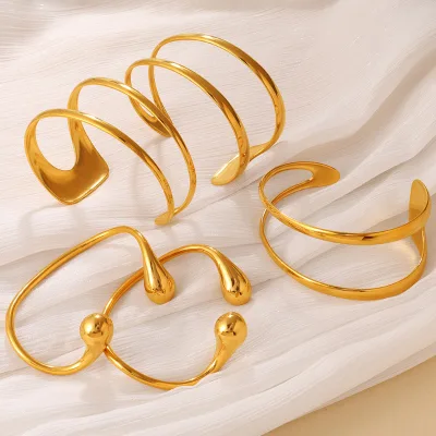 This simple and fashionable classic double-ended teardrop opening bracelet from Europe America is plated with 18K real gold