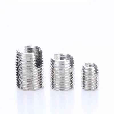 Slotted Self Tapping Thread Insert with Wide Opening Groove, Thread Reinforcing Bushing for Aluminum Plastic Workpiece Assembly