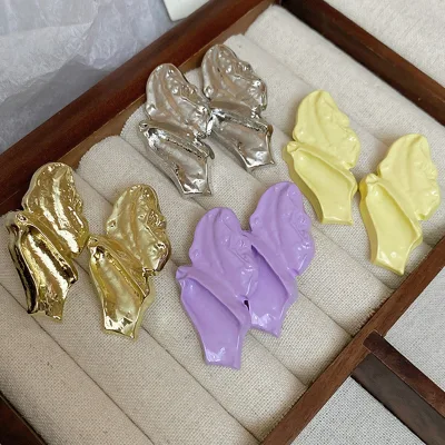 Spray painted irregular wrinkles oval earrings temperament versatile earrings light luxury high-end earrings