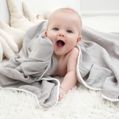 Super Soft Touch Solid Color 100% Cotton Crinkle Muslin Fabric Swaddle Wrap Pom Pom Baby Muslin Blanket