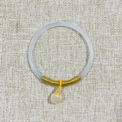 light grayish white natural jade stone bangles with golden yellow cords and light beige pendant