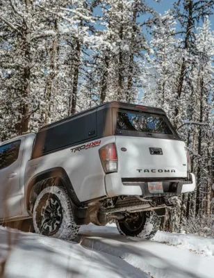 All-Season Truck Topper with Ventilated Storage for Work Equipment
