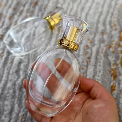 body perfume spray bottle 30ml 50ml oval spray glass perfume bottles 100 ml custom perfume bottle with box packaging