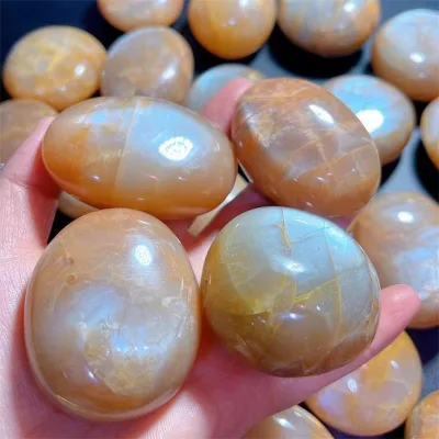 Wholesale natural polished orange moonstone quartz crystal healing crystal palm stone for gifts decorations