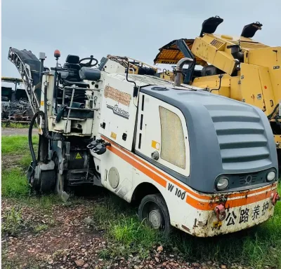 Well Preserved Pre-owned 2010 Wirtgen W100 Milling Machine Durable Cutting Drum Suited for Urban Pavement Maintenance Projects