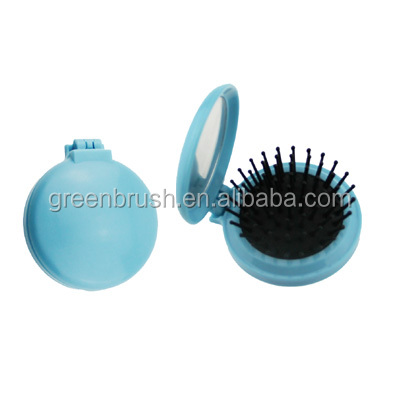 Light blue pocket hair brush with mirror