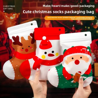 Wholesale Fashion Christmas Portable PE Plastic Gift Bag Santa Reindeer Candy Cookie Food Packaging Pouches with Hang Hole