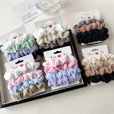 Wholesale cute hair scrunchie sets in various colors for girls.