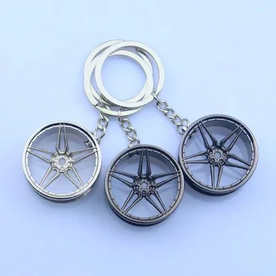 Wholesale Metal Car Wheel Hub Keychain Creative 5-Spoke Car Wheel Keychain OEM Logo High Polished Black Rim Key Ring Souvenir