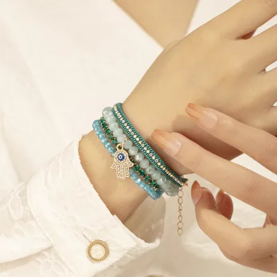 Multi-layer Bracelet with Alloy Eye Pendant, Crystal Beads, and Topaz Stones